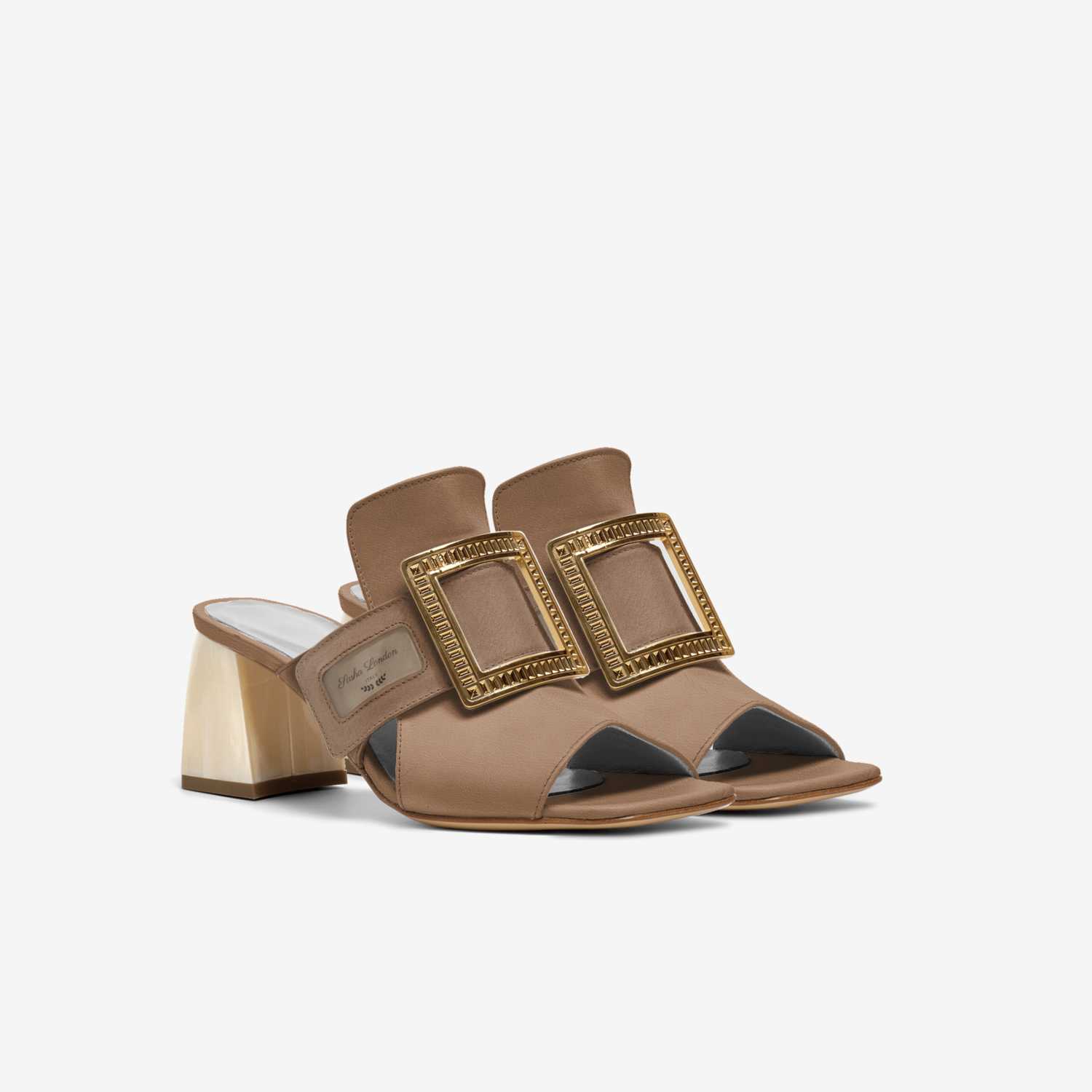 Elegant, Buckled Dress Shoes
Luxurious tan leather shoes with decorative gold-toned metal buckles, resting on a modest block heel for comfort and style.