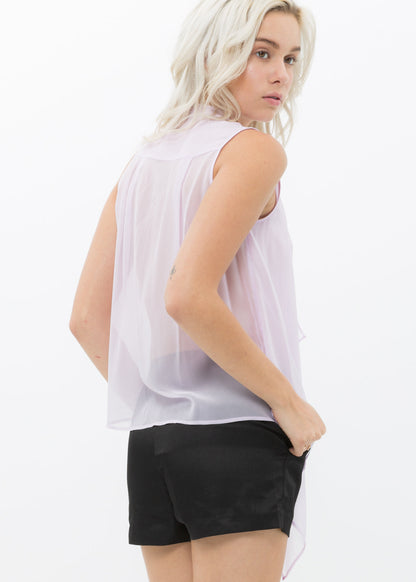 Soft white silk drape blouse with flattering flowy design, elegant feminine fashion for the modern woman.