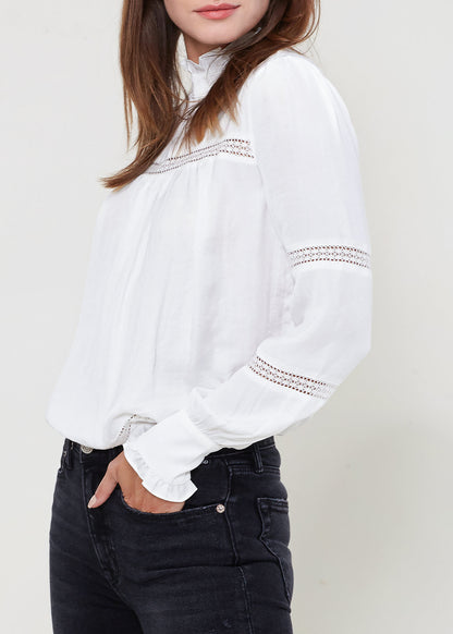 Women's Eyelet Long Sleeve Mock Neck Top in white with embroidered detail on sleeves and neckline