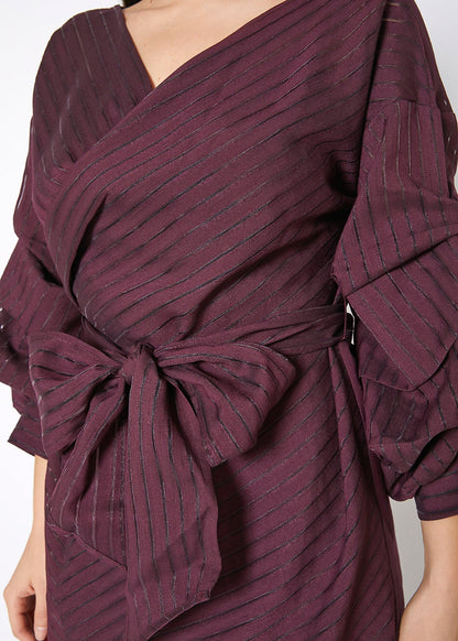 Burgundy organza stripe wrap dress with draped sleeves and tie waist detail