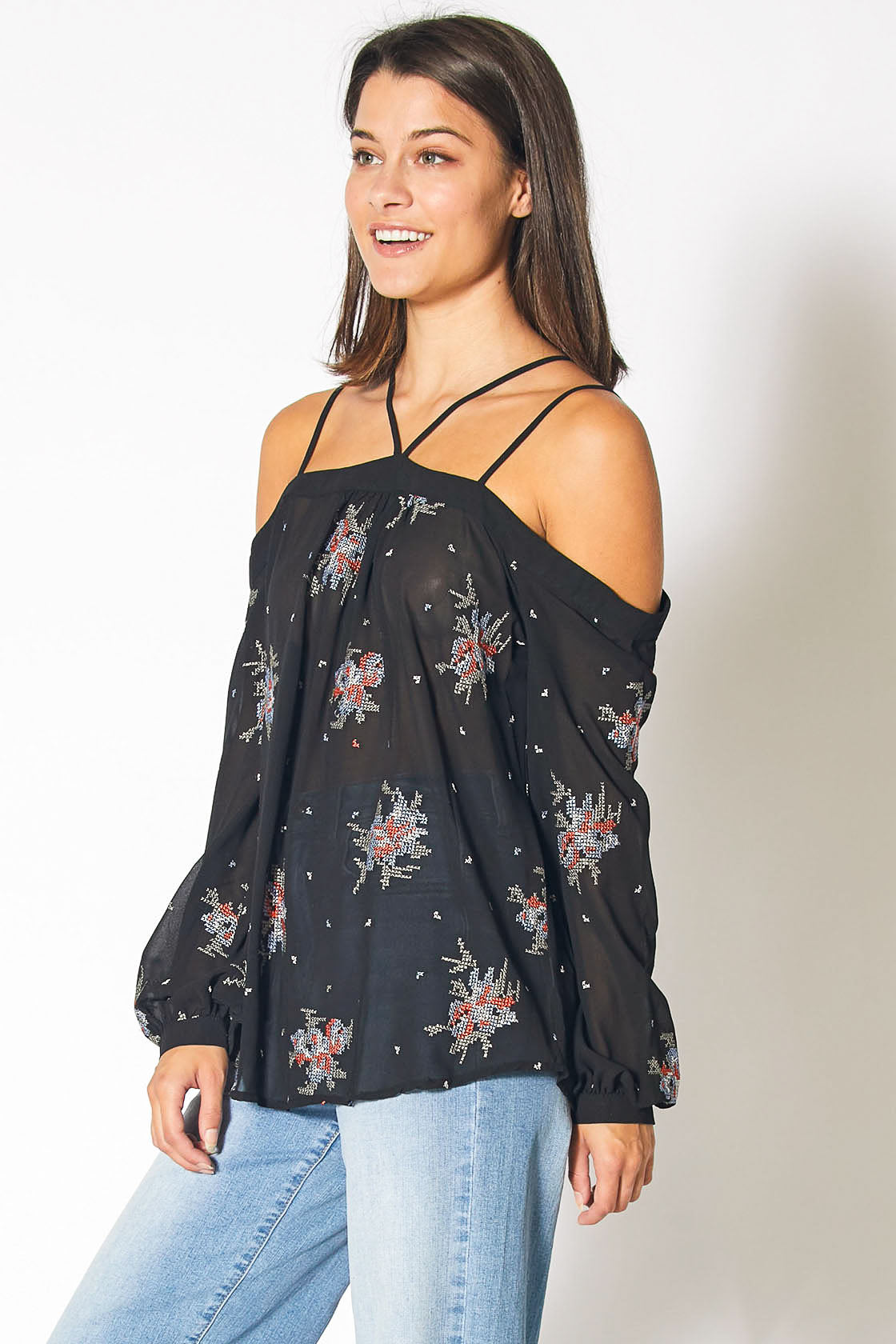 Floral print off-shoulder blouse with spaghetti straps and loose fit design