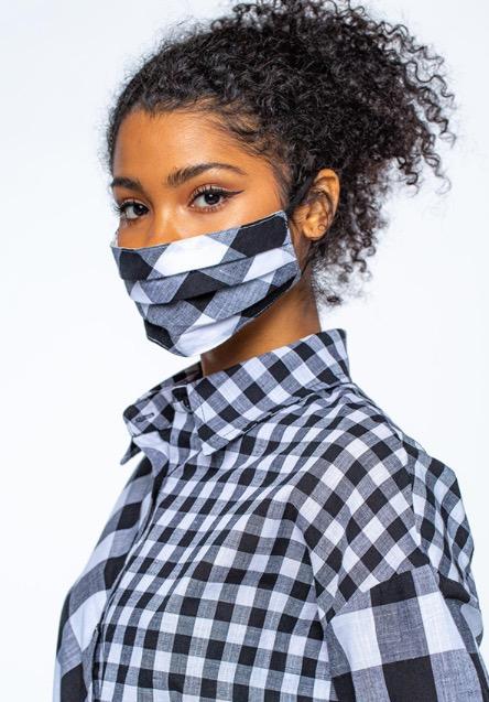 Patterned Plaid Shirt with Matching Face Mask
Stylish women's plaid shirt with coordinating patterned face mask, featuring a checked design in black, white, and grey tones.