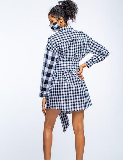 Stylish gingham print dress with matching face mask, featuring a modern silhouette and trendy accessories for the fashion-conscious consumer.