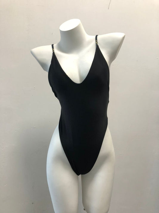 Sleek black swimsuit with a plunging neckline, showcased on a white mannequin.