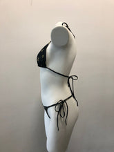 Load image into Gallery viewer, Elegant black lace triangle bikini top on white mannequin body, showcasing a stylish and sophisticated swimwear design.