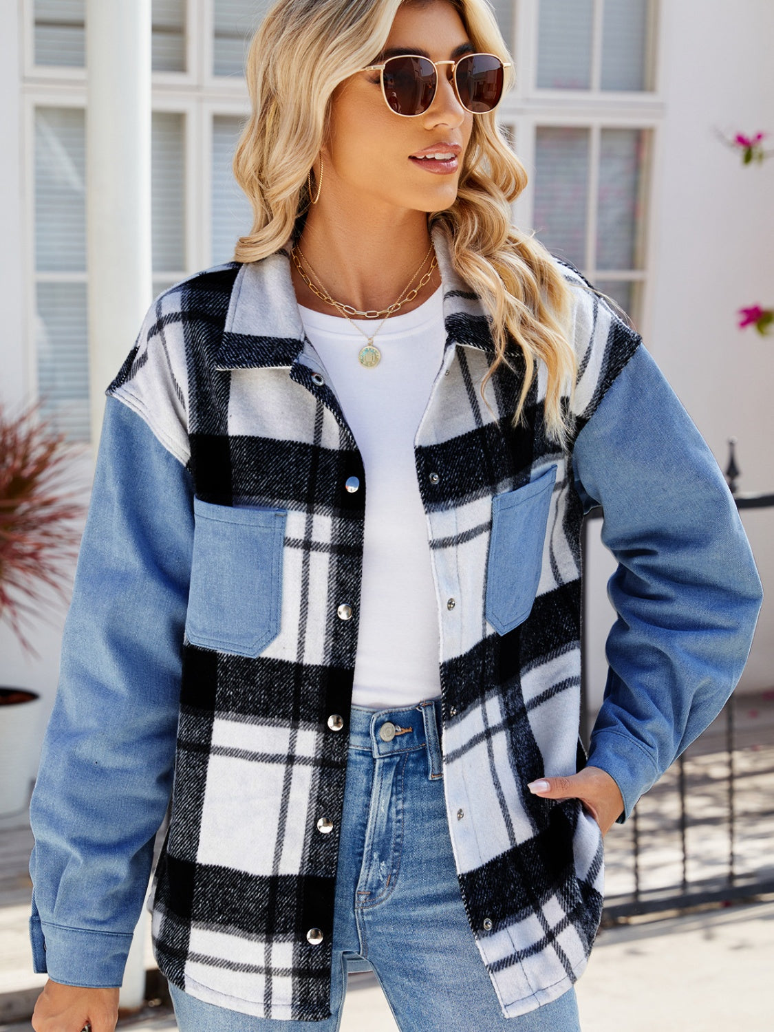 Stylish pocketed plaid snap down denim jacket with classic chic appeal, featuring a flattering fit and versatile casual design.