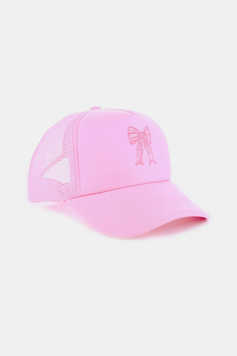 Trendy pink baseball cap with bow embroidery detail, perfect for a casual and stylish look.