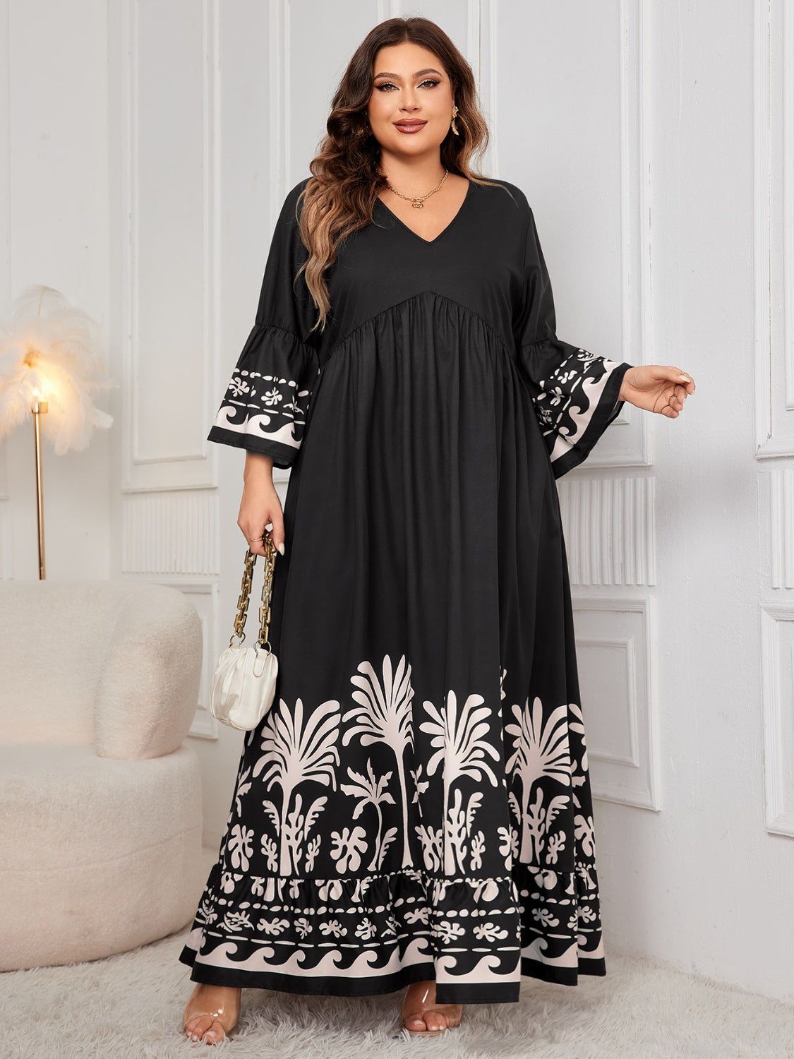 Elegant plus-size floral print dress with long sleeves and V-neck design, perfect for a stylish and comfortable look.