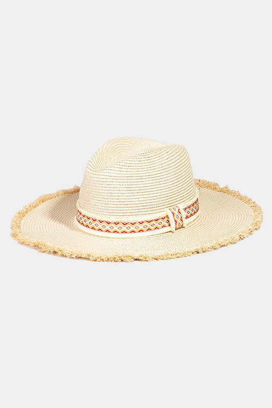 Stylish geometric pattern sun hat with raw textured edges, perfect for sunny summer days.