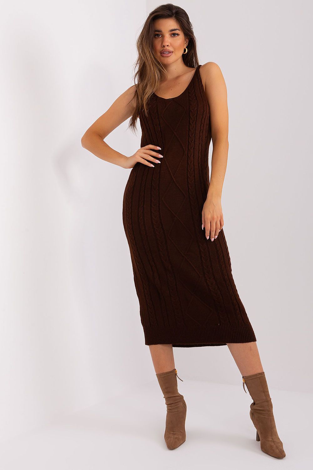 Elegant velvet midi dress in a rich chocolate brown color, featuring a sleek and flattering silhouette. The model is posing confidently, showcasing the dress's luxurious texture and sophisticated style.