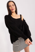 Load image into Gallery viewer, Quilted black sweater with off-the-shoulder design, paired with houndstooth print mini skirt, showcasing fashionable women&#39;s apparel.