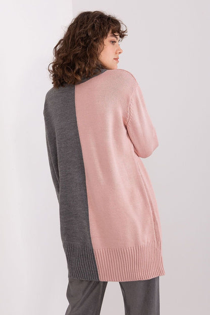 Stylish turtleneck sweater in pink and grey shades, featuring a cozy knit design and figure-flattering silhouette for the modern fashionista.