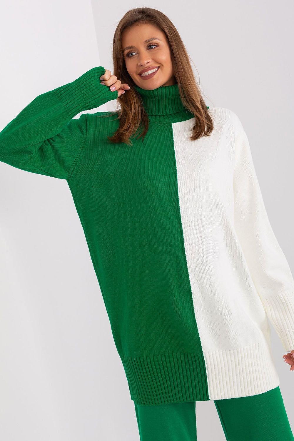 Cozy green turtleneck sweater dress with contrasting white sleeve detail