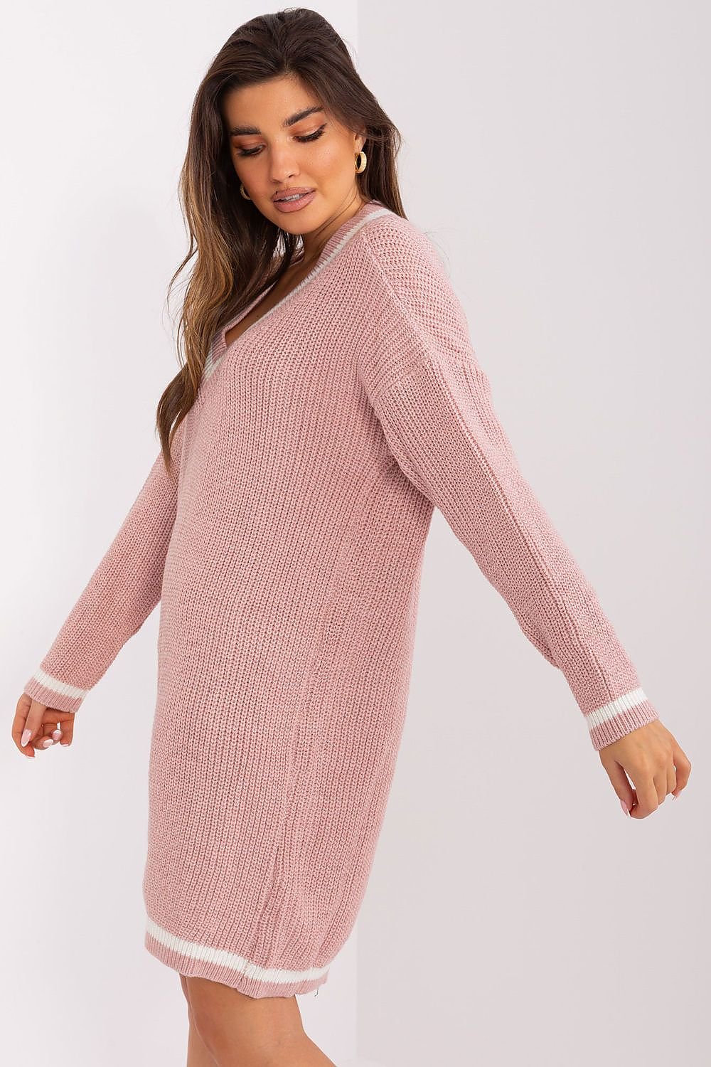 Cozy pink knit dress with long sleeves, casual and comfortable winter outfit for the stylish woman.