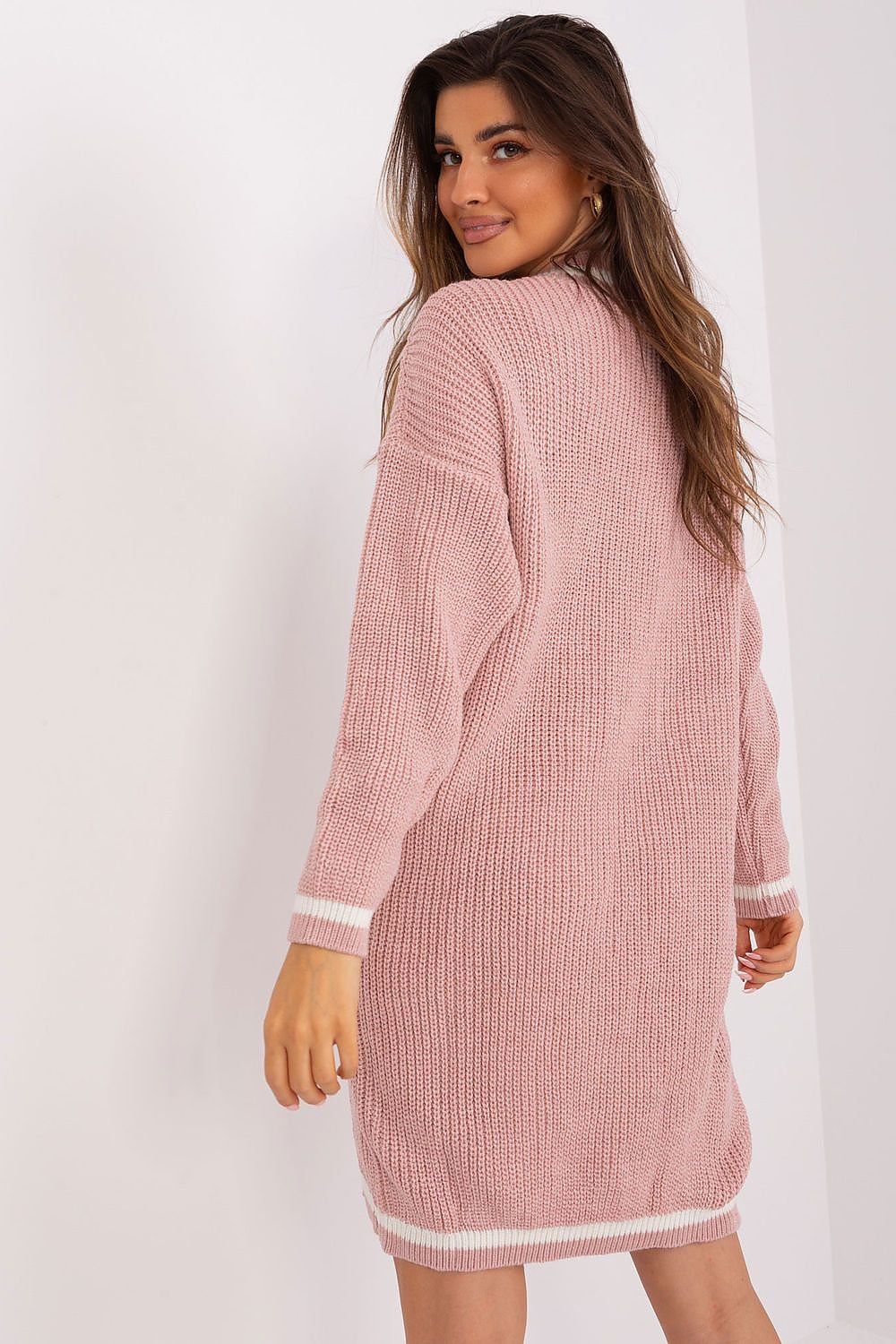 Soft pink ribbed knit dress with long sleeves, perfect for casual chic style.