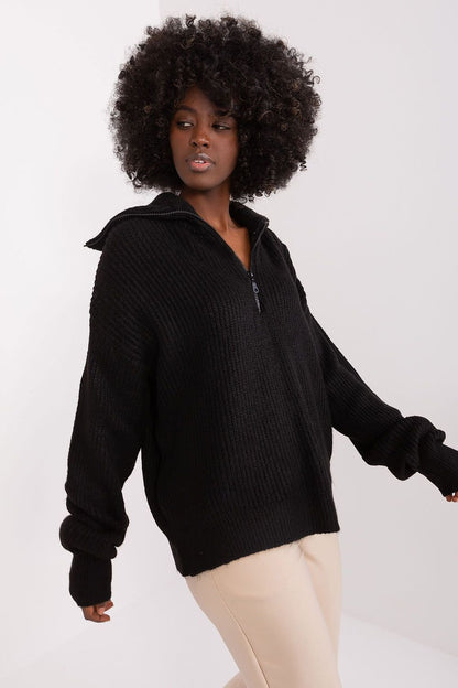 Stylish black turtleneck sweater with textured knit design for the modern, fashionable woman.