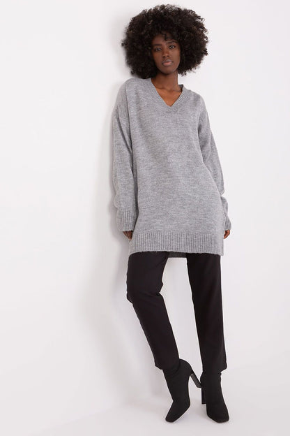 Cozy grey knit jumper by Badu, featuring a V-neck design and relaxed fit for comfortable seasonal style.