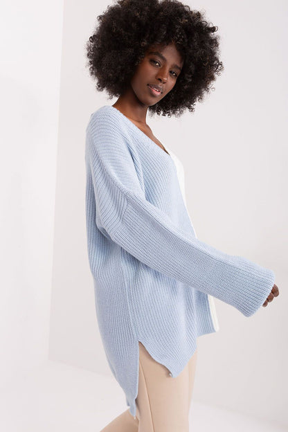 Light blue lightweight ribbed knit Badu jumper featuring flared sleeves and a relaxed silhouette for a casual, comfortable look.