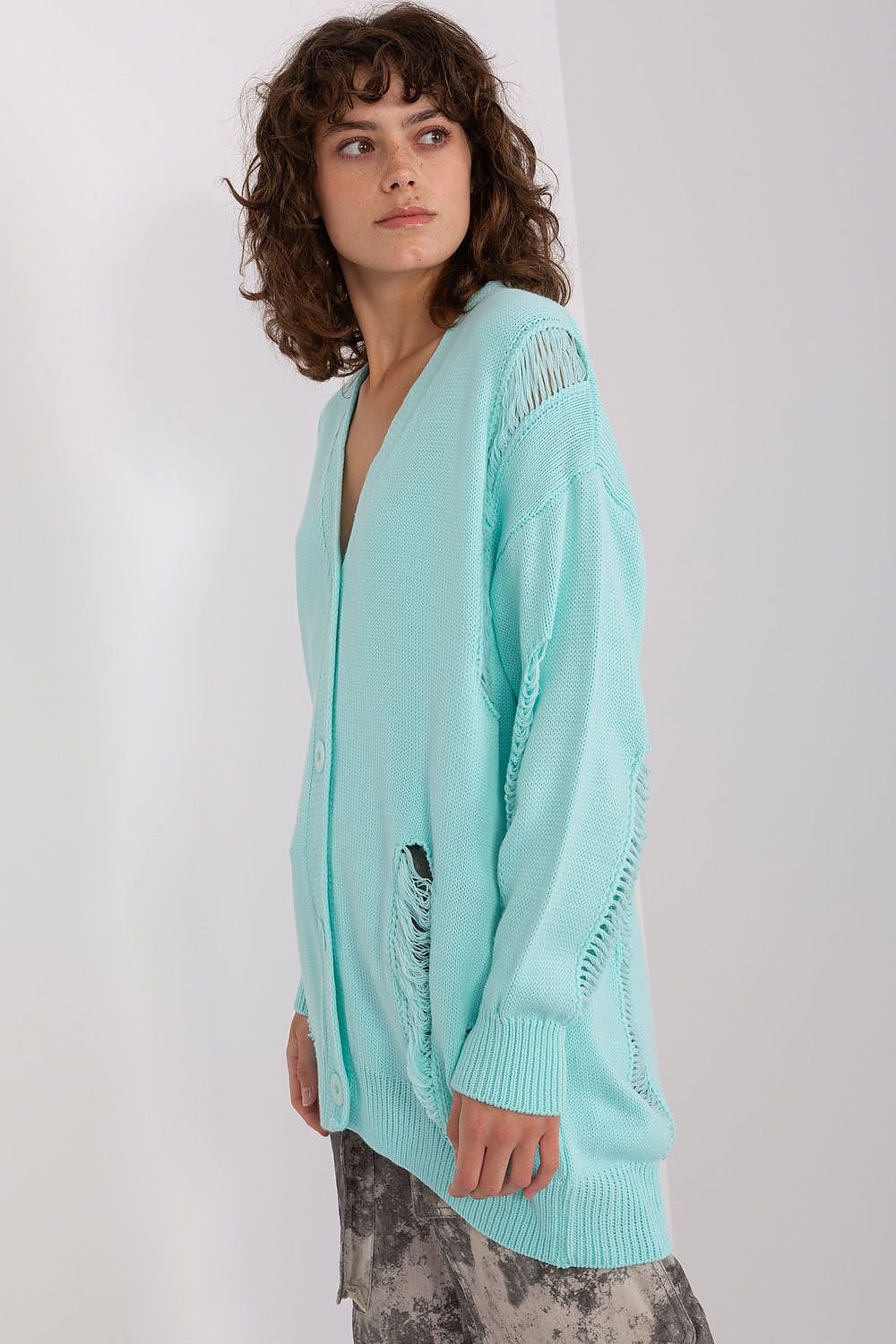 Mint green cardigan sweater with textured knit pattern