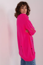 Load image into Gallery viewer, Vibrant pink cardigan with unique button details, worn by a young woman with wavy dark hair against a plain background.