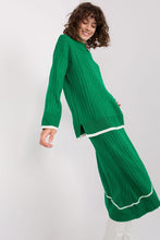 Load image into Gallery viewer, Elegant green ribbed midi dress with puff sleeves, worn by a smiling young woman with curly hair.