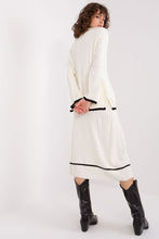 Load image into Gallery viewer, Elegant white ribbed midi dress with puff sleeves and contrasting black trim, worn by a young woman with curly hair against a plain white background.