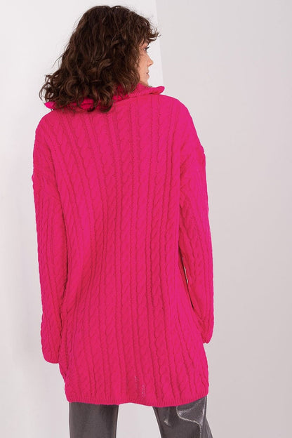 Elegant fuchsia pink cocoon cardigan by Badu, featuring a cozy cable knit pattern and oversized silhouette.