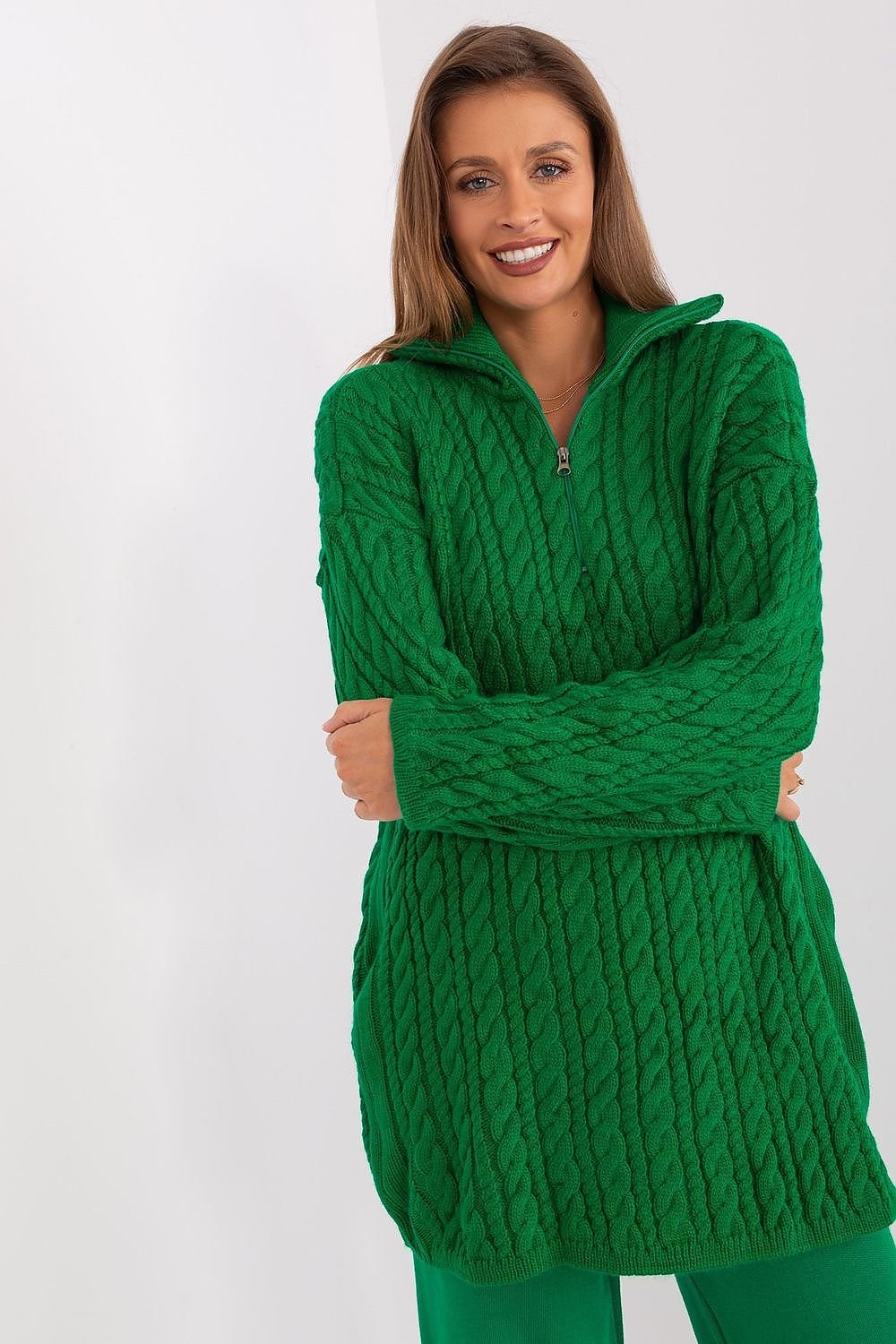 Stylish green quilted jacket from Badu with a mock neck collar and long sleeves, showcased on a smiling female model.