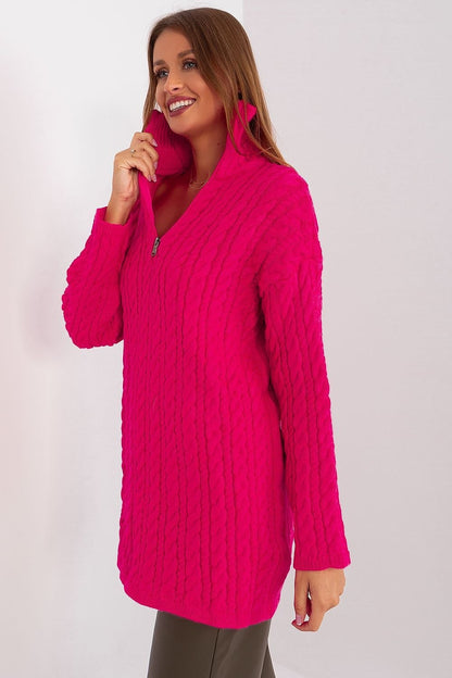 Elegant fuchsia pink cable-knit cardigan by Badu, featuring a stylish cocoon silhouette and cozy comfort.