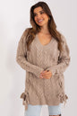 Elegant knit sweater dress by Badu: A cozy and stylish sweater dress with intricate cable knit pattern and laced sleeves, perfect for casual or formal occasions.