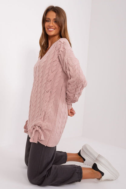 Cozy Knit Sweater Dress by Badu - Elegant blush-colored cable knit dress with long sleeves and a relaxed, comfortable fit.