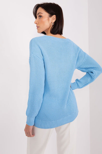 Elegant sky blue braided knit cardigan worn by female model