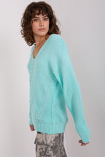 Load image into Gallery viewer, Turquoise knit sweater worn by a woman with curly dark hair against a white background