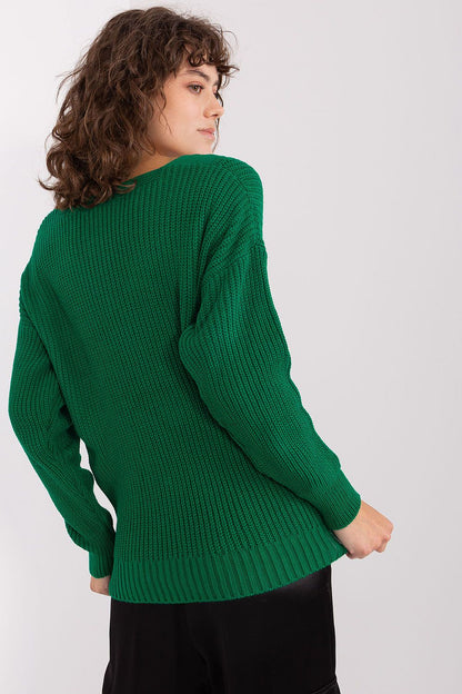 Cozy green knit pullover sweater by Badu, featuring a soft and warm textured design for casual style.