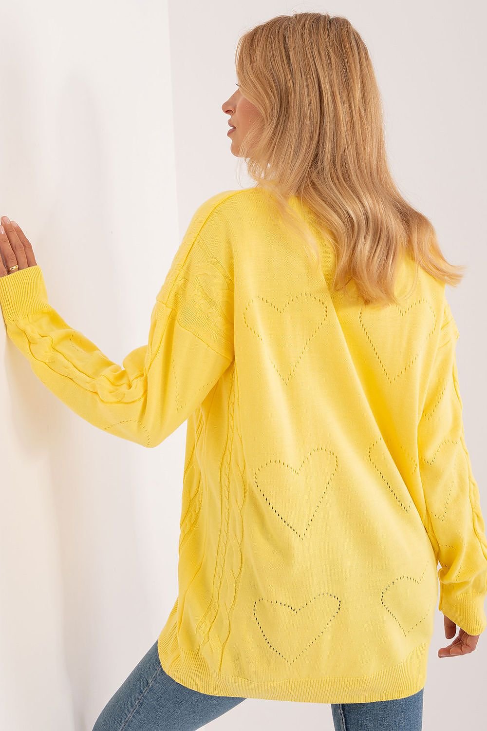 Vibrant yellow heart-patterned knit sweater for women