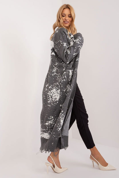 Elegant floral jacquard maxi cardigan with floral print in shades of gray and white against a white background.