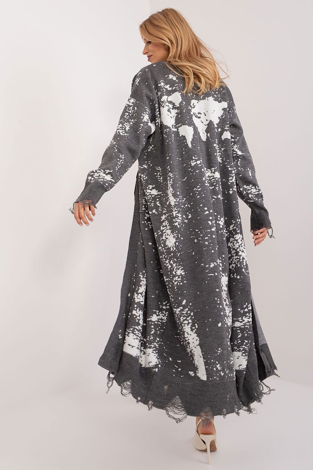 Elegant floral jacquard maxi cardigan with allover abstract world map print, featuring an open front design, long sleeves, and a flowing silhouette.