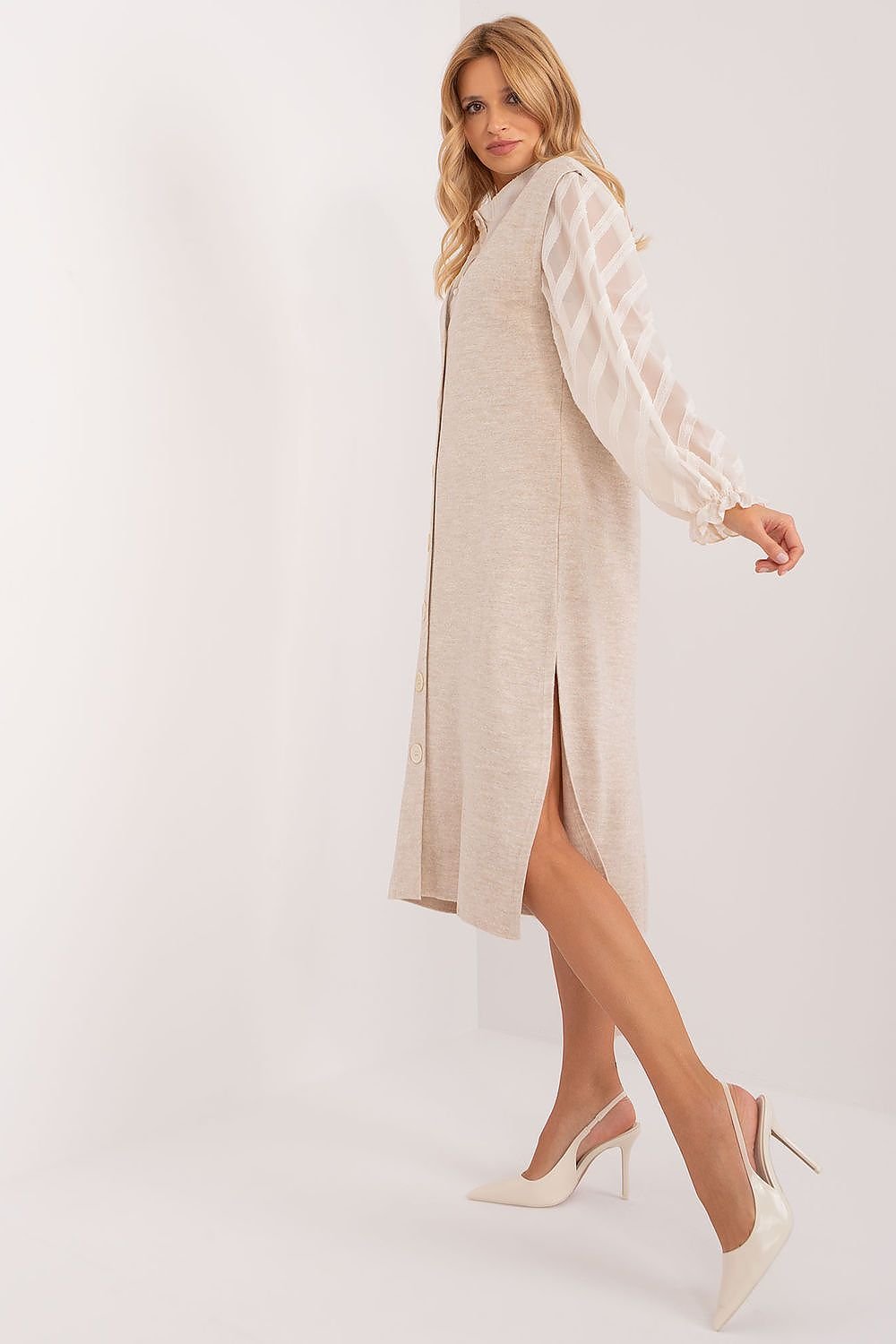 Elegant lace-trimmed beige midi dress with puff sleeves, featuring a flattering front slit for a feminine silhouette.