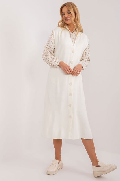 Elegant lace-trimmed beige midi dress from Badu, featuring a stylish white button-down design and puff sleeves.