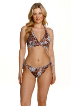 Load image into Gallery viewer, Leopard print swimsuit with halter top and tie-side bottoms, modeled by a blonde woman smiling against a white background.