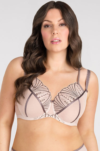 Elegant floral lace brassiere in soft, neutral hues showcases feminine curves and exquisite craftsmanship.