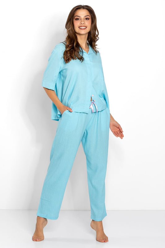 Cozy and comfortable blue pajama set featuring a relaxed top and matching pants, perfect for a night of lounging.