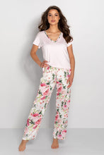 Load image into Gallery viewer, Soft, feminine floral pajama set featuring a relaxed white top with a delicate floral trim and flowing floral print pants for stylish sleepwear.