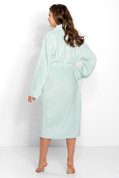 Soft mint green hooded bathrobe with a belted waist and long sleeves, displayed on a woman with long wavy hair standing against a white background.