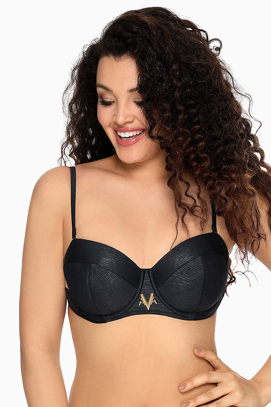 Stylish black swimwear bra with gold metal accents, capturing a woman's curvy figure and long, luscious dark curly hair.