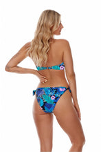 Load image into Gallery viewer, Tropical floral bikini top and bottoms with vibrant blue, pink, and green pattern on a slim female model with long blonde wavy hair.