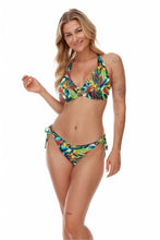 Load image into Gallery viewer, Floral patterned swimsuit bra with a halter neckline, worn by a smiling blonde woman with tattoos