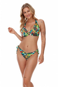 Floral patterned swimsuit bra with a halter neckline, worn by a smiling blonde woman with tattoos