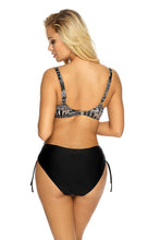 Load image into Gallery viewer, Stylish black and white patterned two-piece swimsuit with adjustable straps and a matching high-waisted bottom showcased on a blonde female model