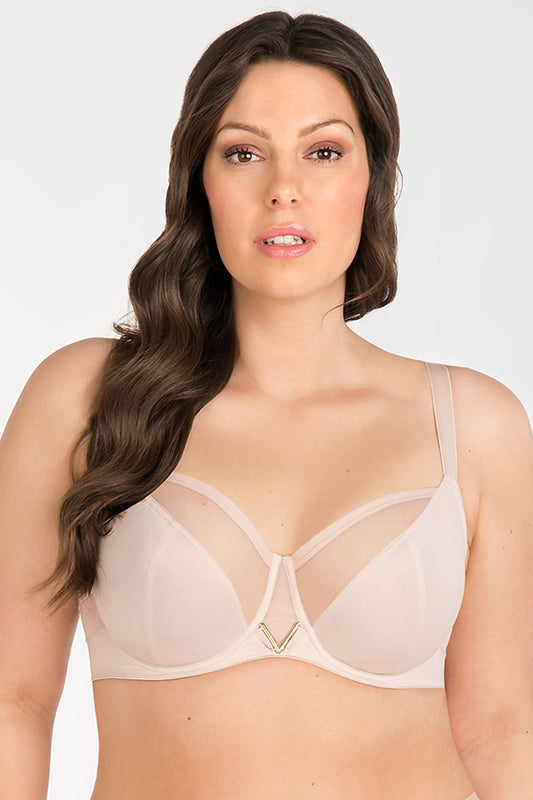 Soft, supportive Gorsenia lingerie bra showcased on a model with long, wavy brown hair against a plain background.